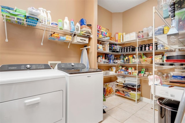 5263 Beach River Rd, Windermere, FL 34786 - washroom featuring independent washer and dryer and tile patterned flooring