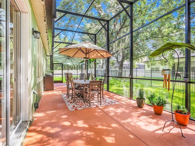 5263 Beach River Rd, Windermere, FL 34786 - sunroom / solarium featuring outdoor dining area