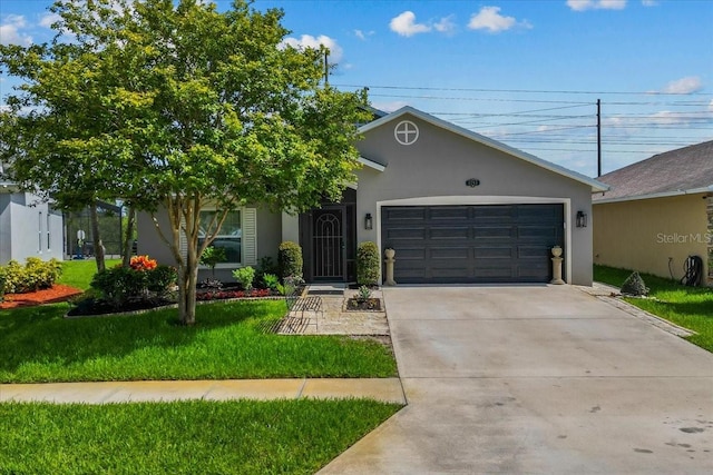 1787 Attilburgh Blvd, Melbourne, FL 32904 - view of front of home featuring an attached garage, a front lawn, concrete driveway, and stucco siding