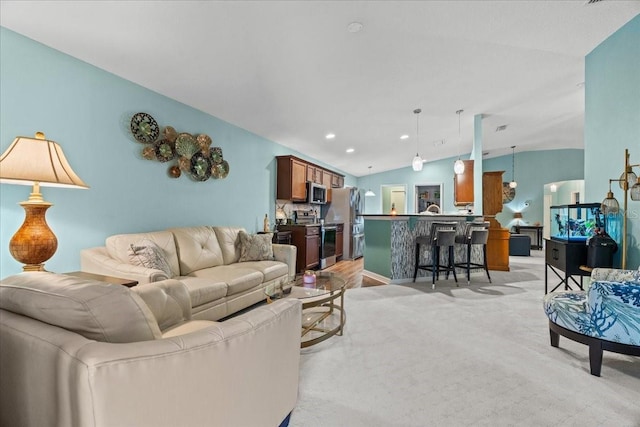 1787 Attilburgh Blvd, Melbourne, FL 32904 - living room featuring vaulted ceiling, light colored carpet, and recessed lighting