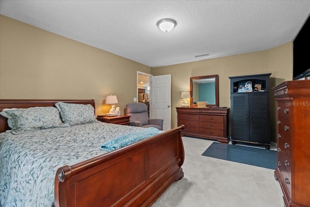 1787 Attilburgh Blvd, Melbourne, FL 32904 - bedroom featuring light carpet and a textured ceiling
