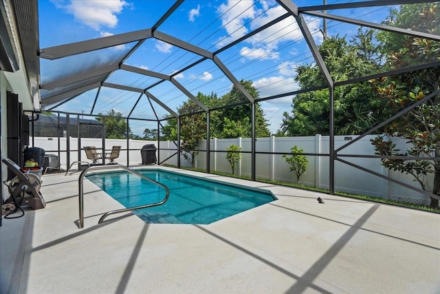 1787 Attilburgh Blvd, Melbourne, FL 32904 - view of swimming pool featuring a patio area, a fenced backyard, and a lanai