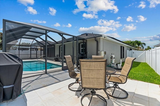 1787 Attilburgh Blvd, Melbourne, FL 32904 - view of swimming pool with a fenced backyard, a patio, a lanai, a gate, and area for grilling