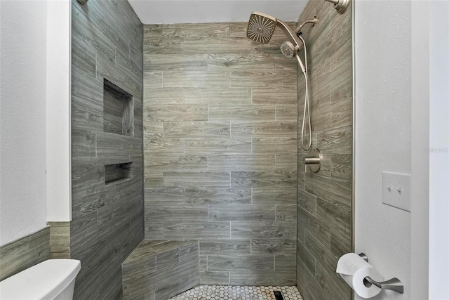 705 Ibis Ave, Deltona, FL 32738 - full bathroom with a tile shower and tile patterned floors