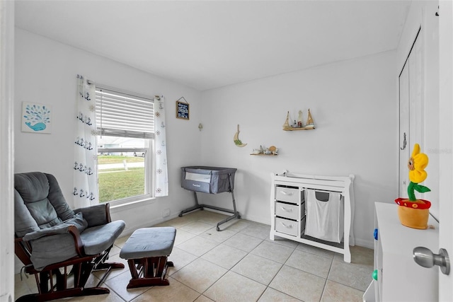 705 Ibis Ave, Deltona, FL 32738 - sitting room featuring light tile patterned floors and baseboards