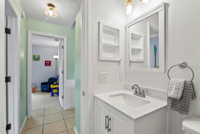705 Ibis Ave, Deltona, FL 32738 - bathroom with tile patterned floors and vanity