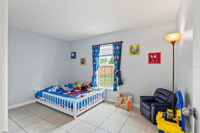 705 Ibis Ave, Deltona, FL 32738 - bedroom with light tile patterned floors
