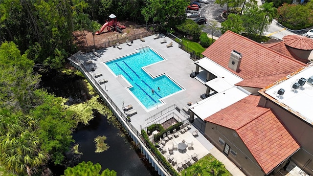 5160 Conroy Rd Unit 21, Orlando, FL 32811 - view from above of property featuring a pool area and a large body of water