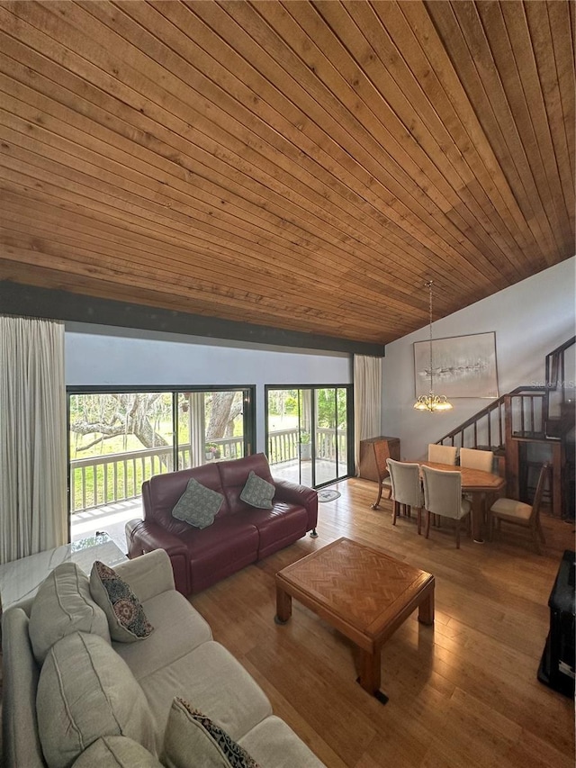 116 Palm View Ct Unit 3535/6, Haines City, FL 33844 - living area with a chandelier, lofted ceiling, wooden ceiling, and wood finished floors