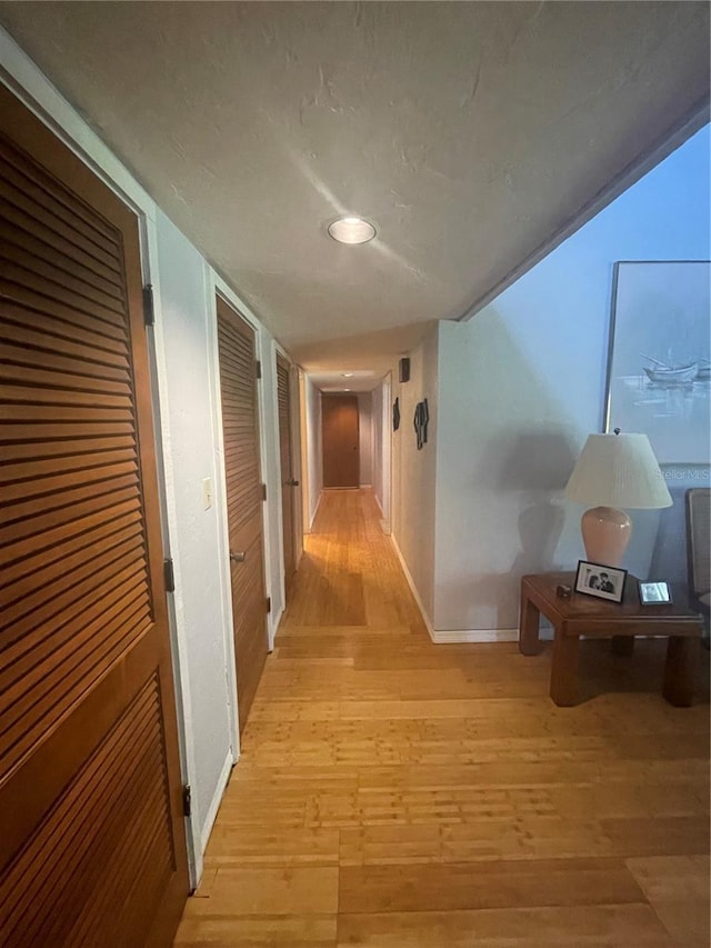 116 Palm View Ct Unit 3535/6, Haines City, FL 33844 - hall featuring light wood-style flooring and baseboards