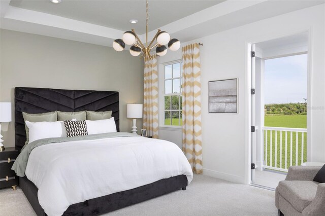 2374 Celebration Blvd, Celebration, FL 34747 - bedroom with a chandelier, carpet floors, recessed lighting, and access to outside