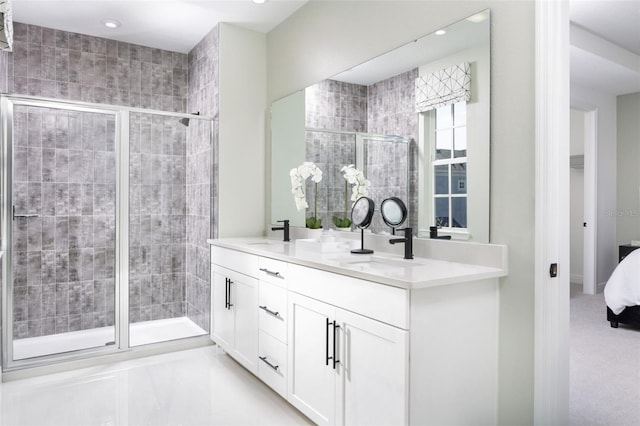 2374 Celebration Blvd, Celebration, FL 34747 - ensuite bathroom with double vanity, a shower stall, and recessed lighting