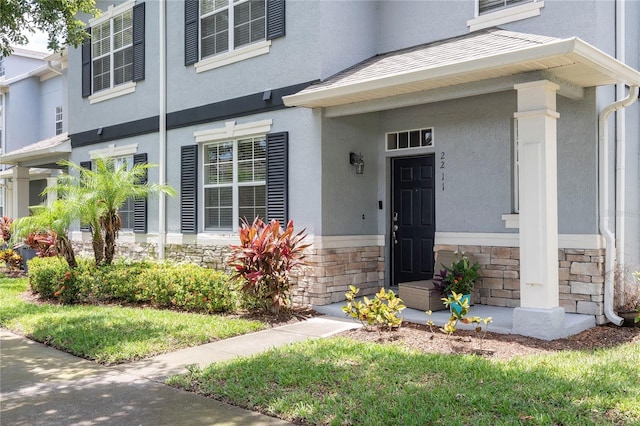 2211 J Lawson Blvd, Orlando, FL 32824 - entrance to property with stone siding and stucco siding