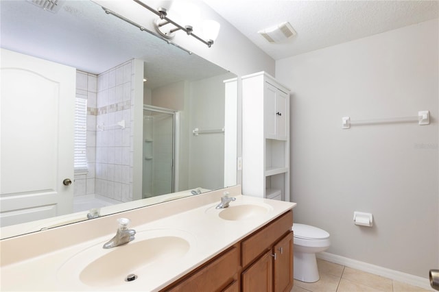 2211 J Lawson Blvd, Orlando, FL 32824 - bathroom with a shower with door, double vanity, tile patterned flooring, a textured ceiling, and a bathtub