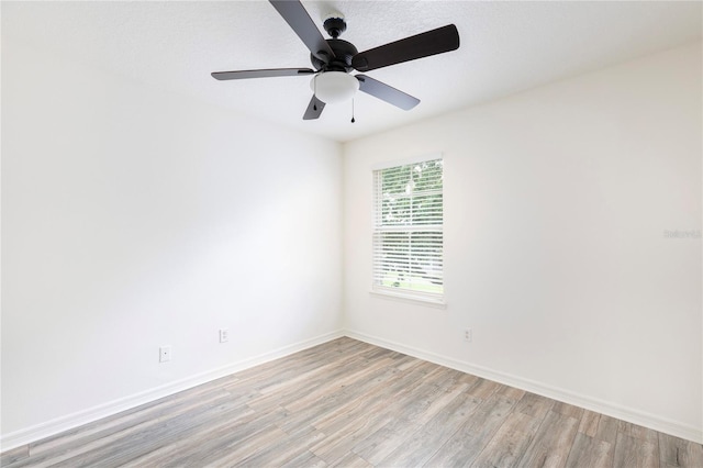 2211 J Lawson Blvd, Orlando, FL 32824 - unfurnished room with light wood finished floors and ceiling fan