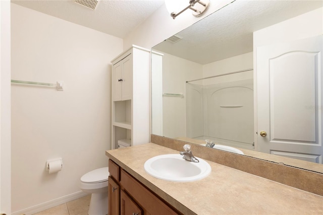 2211 J Lawson Blvd, Orlando, FL 32824 - full bathroom featuring vanity, tile patterned flooring, a textured ceiling, and a shower