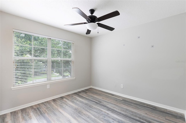 2211 J Lawson Blvd, Orlando, FL 32824 - spare room featuring wood finished floors and a ceiling fan