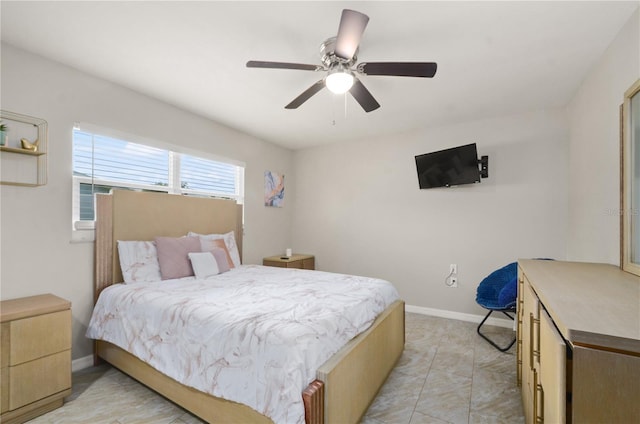 209 7th St S, Haines City, FL 33844 - bedroom with baseboards and a ceiling fan