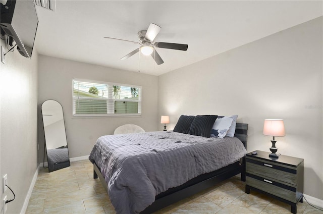 209 7th St S, Haines City, FL 33844 - bedroom featuring baseboards and ceiling fan