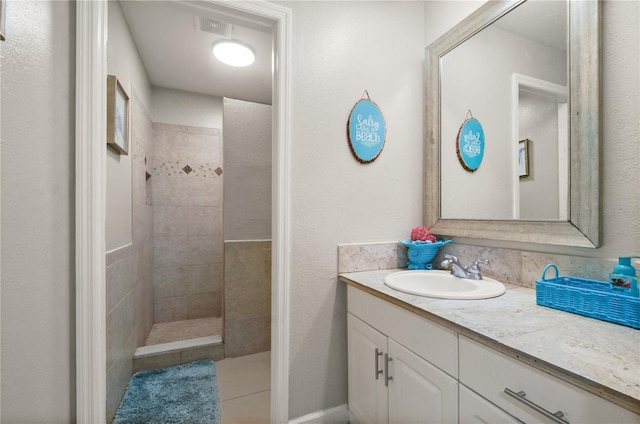 209 7th St S, Haines City, FL 33844 - bathroom with a walk in shower and vanity