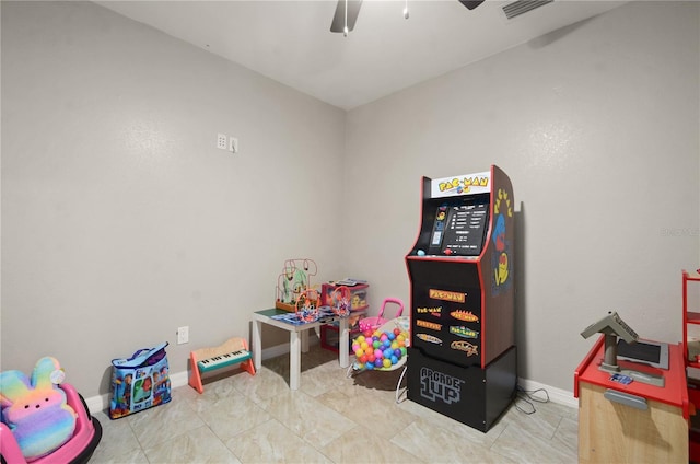209 7th St S, Haines City, FL 33844 - playroom featuring a ceiling fan and baseboards