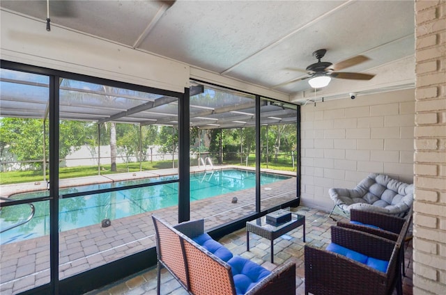209 7th St S, Haines City, FL 33844 - swimming pool featuring outdoor lounge area, a patio, ceiling fan, and a lanai