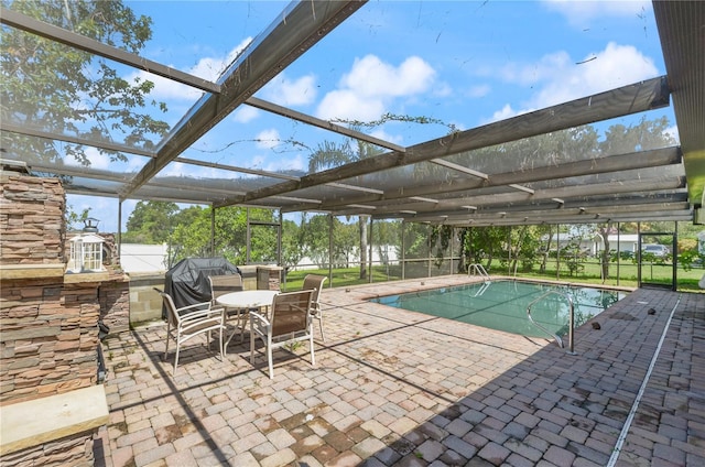 209 7th St S, Haines City, FL 33844 - swimming pool with a patio, glass enclosure, and area for grilling