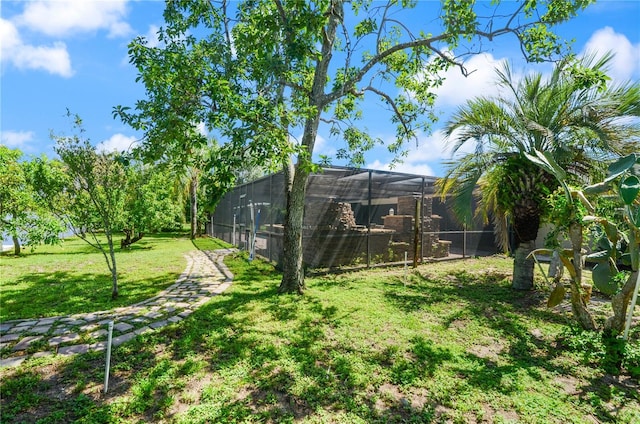 209 7th St S, Haines City, FL 33844 - view of green lawn featuring glass enclosure