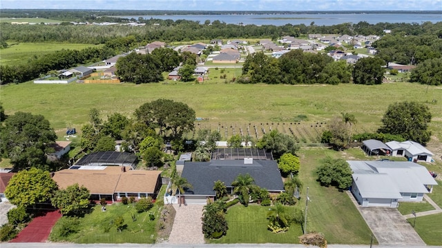 209 7th St S, Haines City, FL 33844 - aerial view of residential area with a nearby body of water