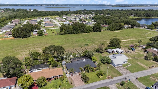209 7th St S, Haines City, FL 33844 - aerial view of residential area with a nearby body of water