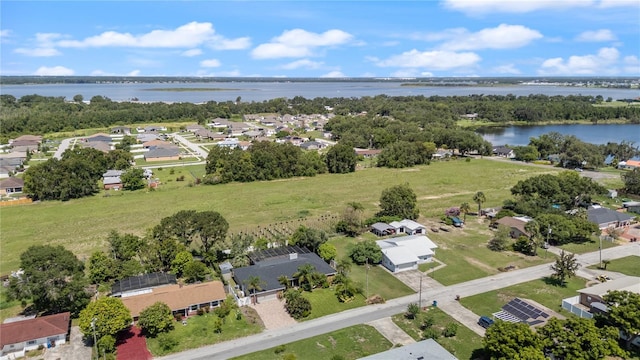209 7th St S, Haines City, FL 33844 - aerial perspective of suburban area with a nearby body of water