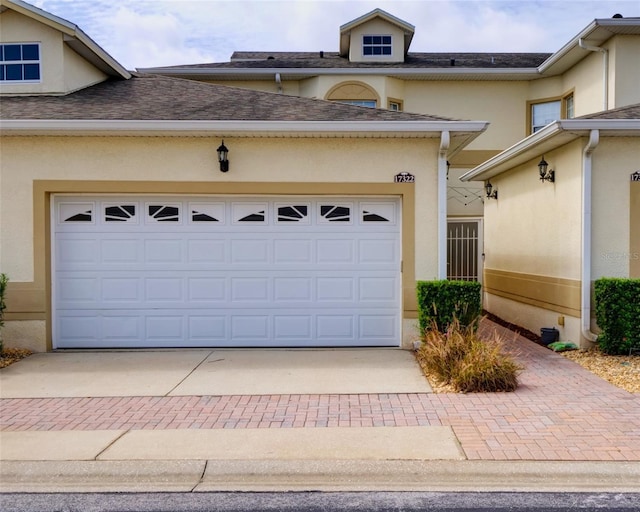 17322 Chateau Pine Way, Clermont, FL 34711 - garage with decorative driveway