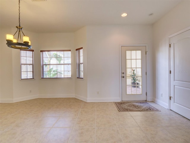17322 Chateau Pine Way, Clermont, FL 34711 - foyer entrance with a chandelier, light tile patterned floors, and recessed lighting