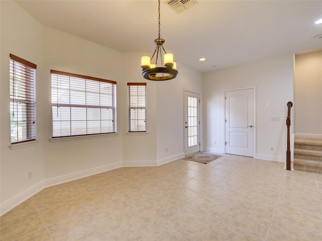 17322 Chateau Pine Way, Clermont, FL 34711 - spare room featuring a chandelier, recessed lighting, light tile patterned floors, and stairway
