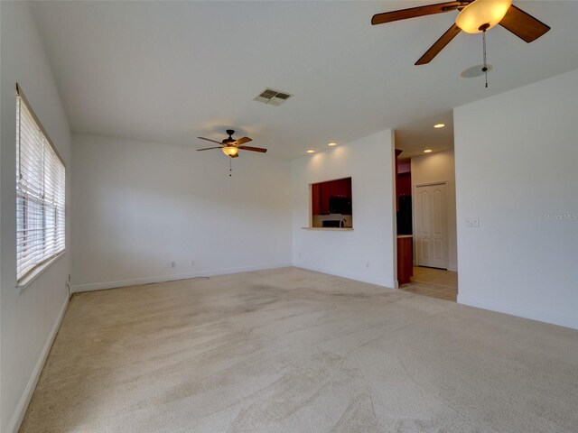 17322 Chateau Pine Way, Clermont, FL 34711 - spare room featuring ceiling fan, light carpet, and recessed lighting