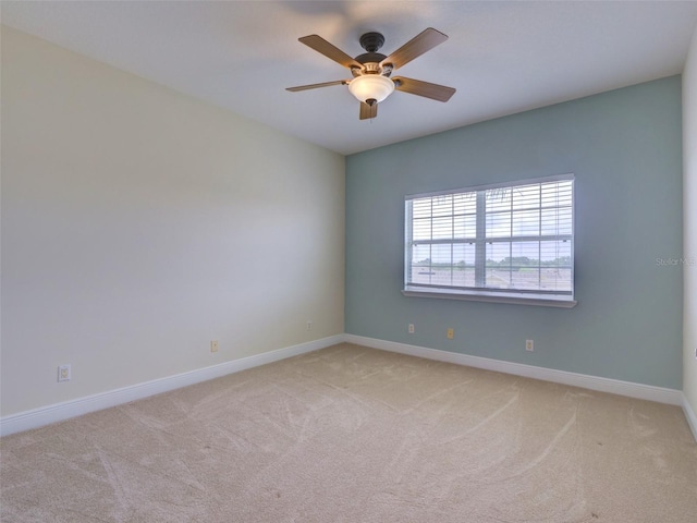17322 Chateau Pine Way, Clermont, FL 34711 - empty room featuring light carpet and ceiling fan