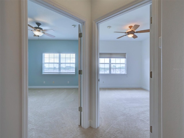 17322 Chateau Pine Way, Clermont, FL 34711 - hallway featuring carpet