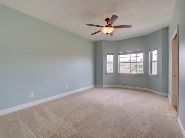 17322 Chateau Pine Way, Clermont, FL 34711 - carpeted spare room with ceiling fan and a textured ceiling