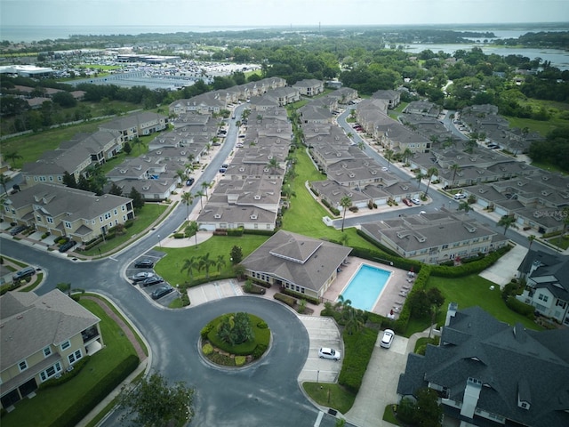 17322 Chateau Pine Way, Clermont, FL 34711 - aerial overview of property's location featuring a large body of water and nearby suburban area