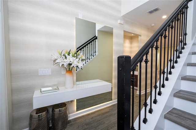 1097 Trappers Trail Loop, Davenport, FL 33896 - staircase featuring wood finished floors
