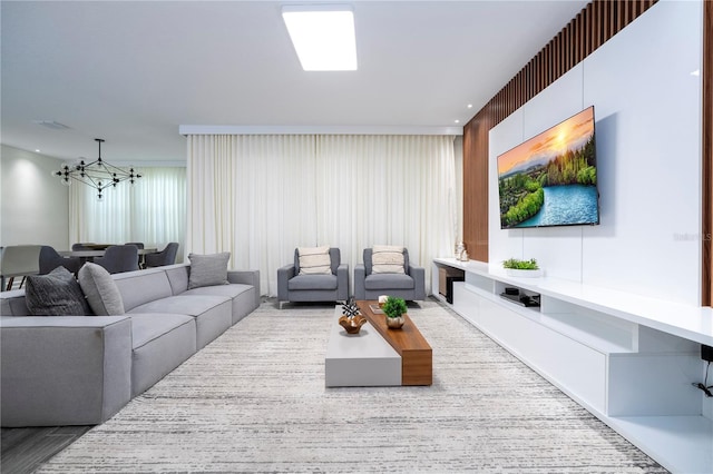 1097 Trappers Trail Loop, Davenport, FL 33896 - living room featuring a chandelier