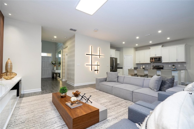 1097 Trappers Trail Loop, Davenport, FL 33896 - living area with recessed lighting and light wood-style floors