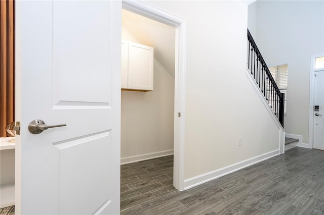 1097 Trappers Trail Loop, Davenport, FL 33896 - staircase featuring wood finished floors and baseboards