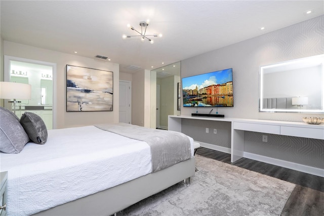 1097 Trappers Trail Loop, Davenport, FL 33896 - bedroom with wood finished floors, a chandelier, ensuite bathroom, and recessed lighting
