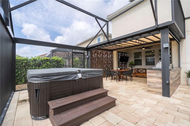1097 Trappers Trail Loop, Davenport, FL 33896 - view of patio with a hot tub, ceiling fan, an outdoor kitchen, a lanai, and outdoor dining area