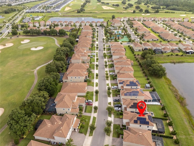 1097 Trappers Trail Loop, Davenport, FL 33896 - aerial view of property and surrounding area with a large body of water and nearby suburban area