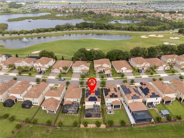 1097 Trappers Trail Loop, Davenport, FL 33896 - aerial perspective of suburban area featuring a golf club and a large body of water