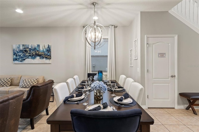 2121 Morocco Way, Kissimmee, FL 34747 - dining room with a chandelier and light tile patterned floors