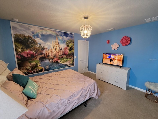 2121 Morocco Way, Kissimmee, FL 34747 - bedroom with a chandelier and carpet floors