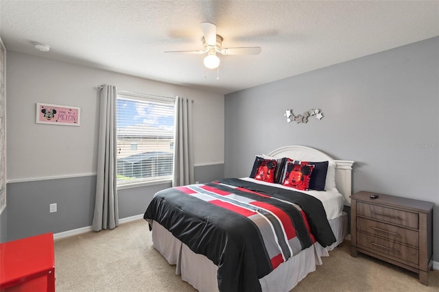 2121 Morocco Way, Kissimmee, FL 34747 - bedroom with light colored carpet and ceiling fan
